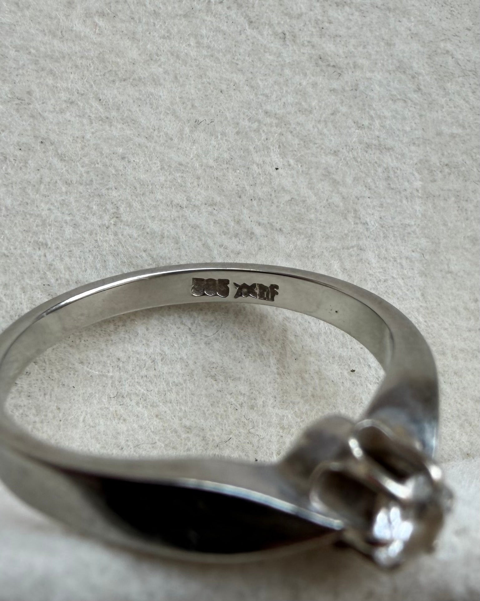 Vintage 14 karat hvidguldsring med 0,18 ct. brilliant
