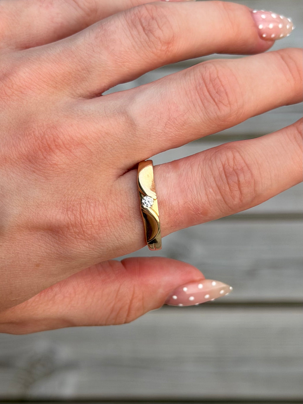 Vintage Hearts & Arrows 14 karat guldring med 0,10 ct. diamant